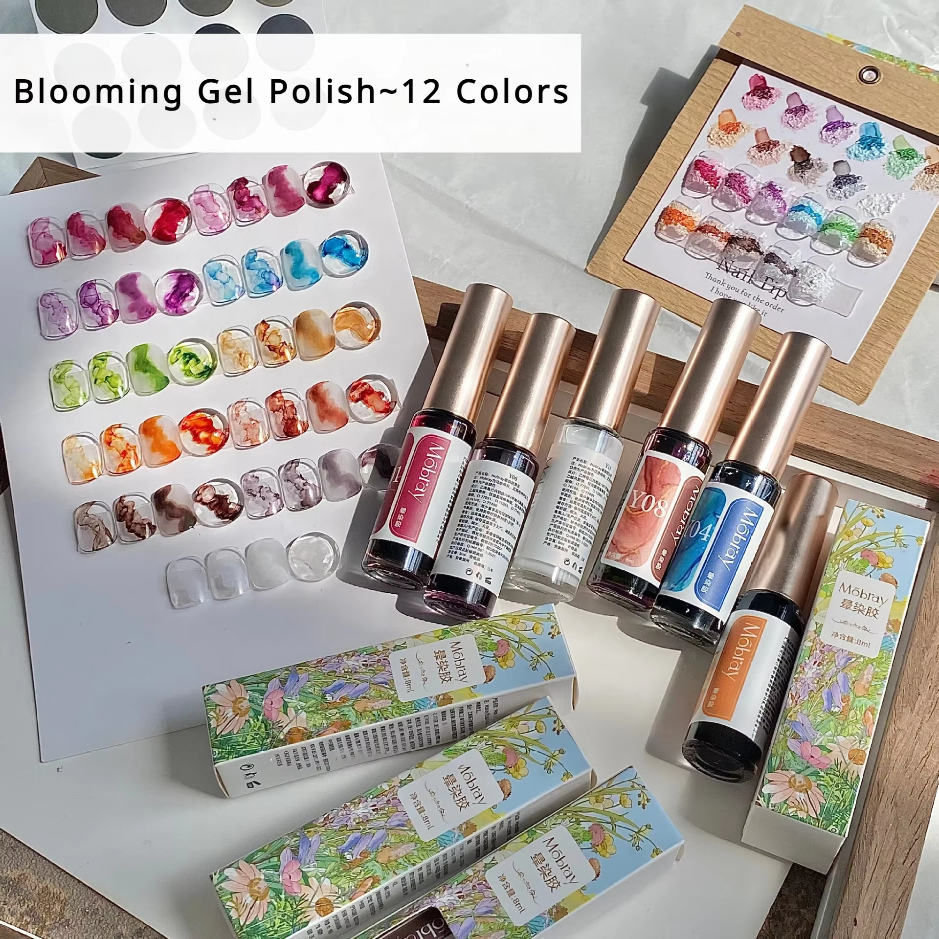 Blooming Nail Polish Marble Ink Nail Tint Gel Watercolor shown in a set of 12 colors with bottles and swatches, described as an ink nail art blossom gel polish semi-permanent soak-off UV gel varnish.